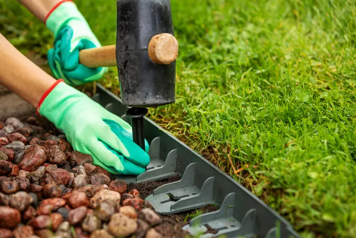 How Professional Edging Defines And Protects Lawn Borders in Hobe Sound FL